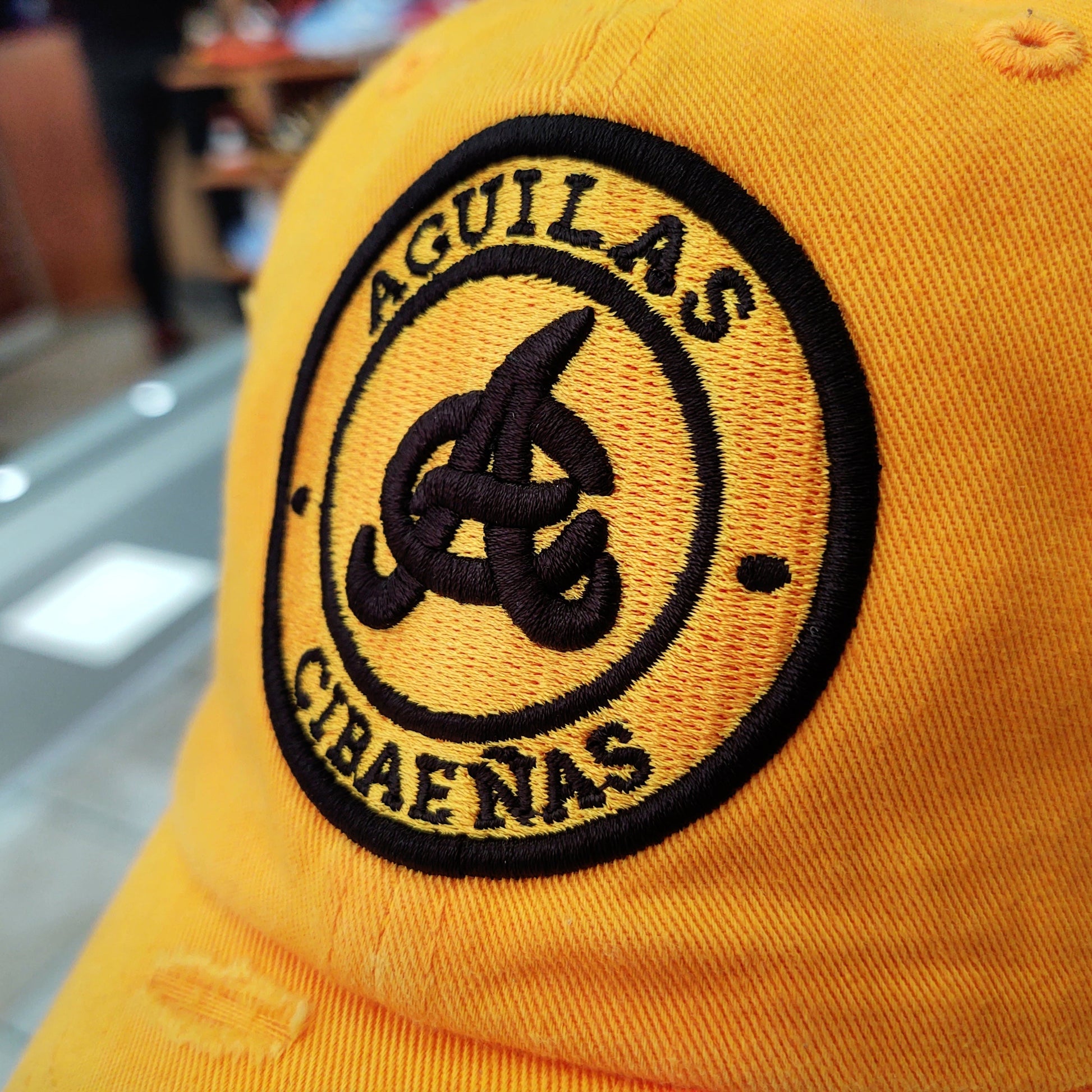 Aguilas Cibaeñas Embroidered Vintage Round-Logo Hat Peligro Sports